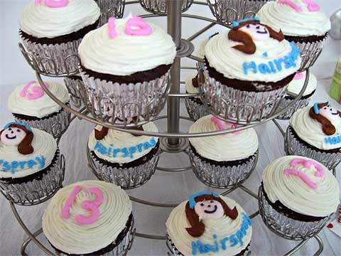 Cupcakes decorated with a Hairspray theme